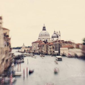 The Water City - St Mark's Cathedral in Venice. Photograph taken with a Lensbaby lens of St Peters cathedral in Venice. Dreamy creams and grey colours.