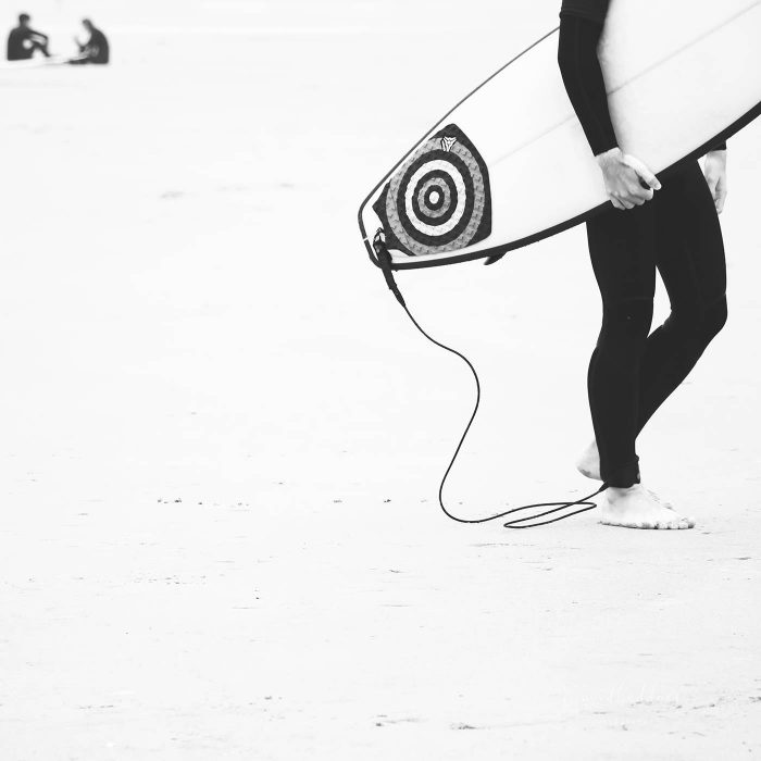Catch a Wave III - Abstract Surf Photography, Black and White Surf image, Surfer walking on the beach.
