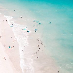 Beach Love V - Aerial Beach Photo. Pink sandy beach with baby blue waters. Surfers and beach lovers by Ingrid Beddoes