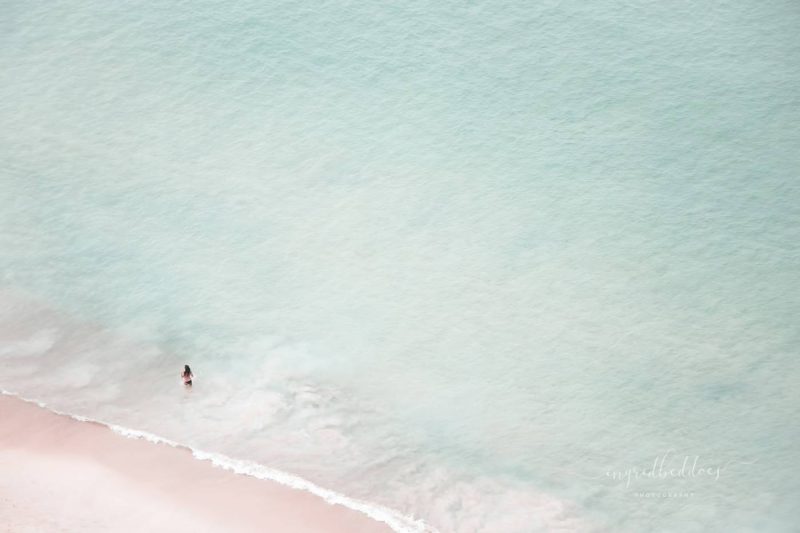 The Black Bikini woman in the sea enjoying the beach Aerial Photography
