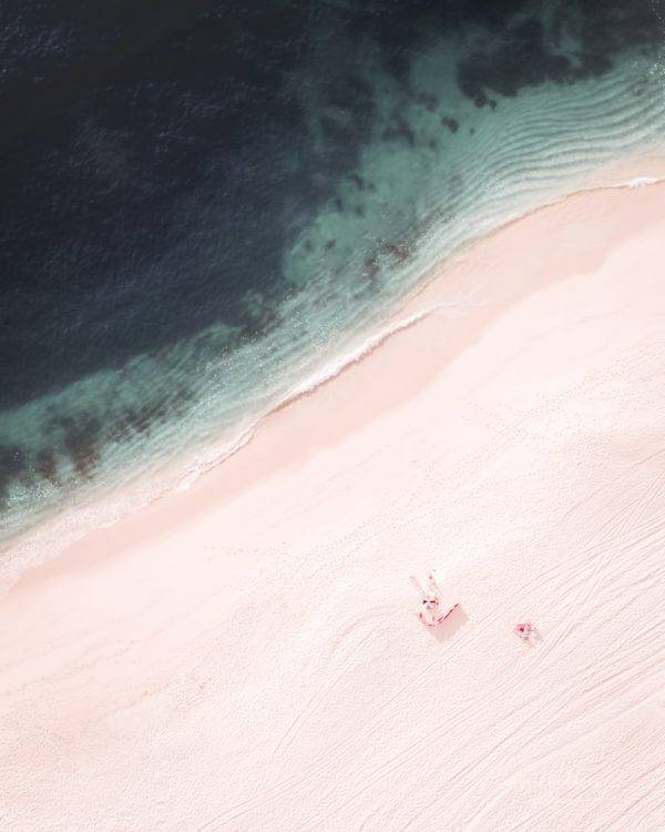 aerial beach photograph of pink sand art print