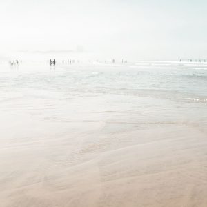 People walking by seaside on a foggy morning. Beach photographic print of "at the beach VI"