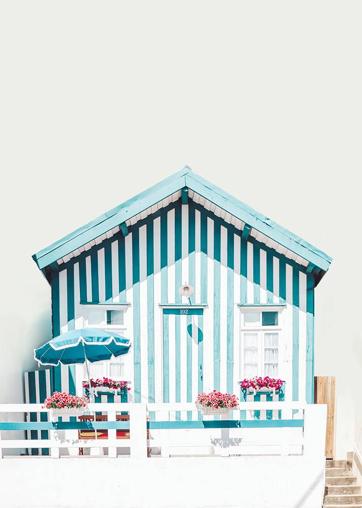 Beach hut with blue and white stripes