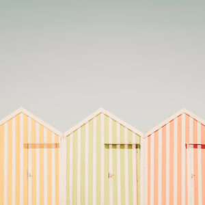 photographic art print of beach huts with pastel colors